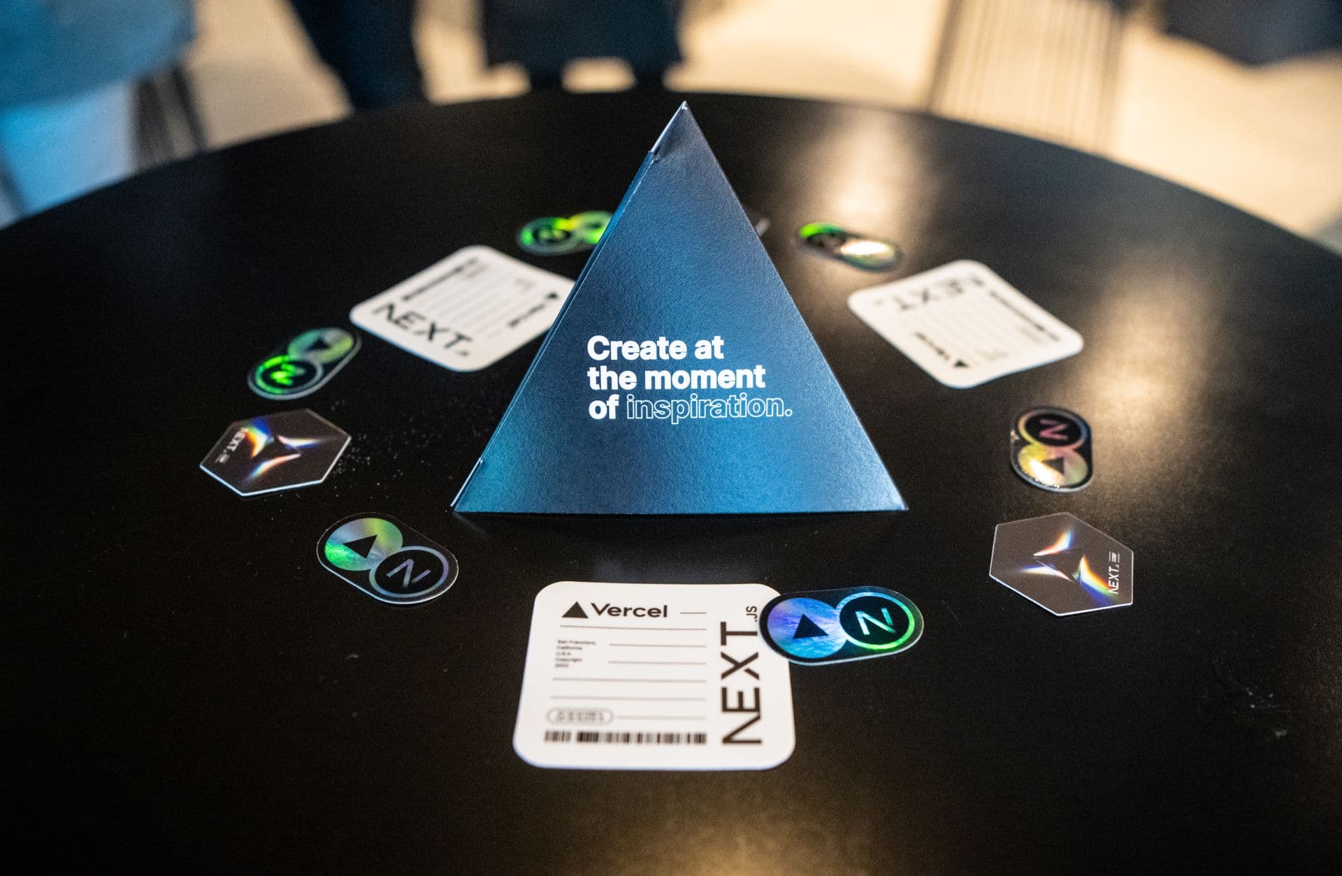 a black table topped with a blue triangle