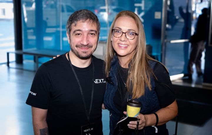 a man and a woman standing next to each other