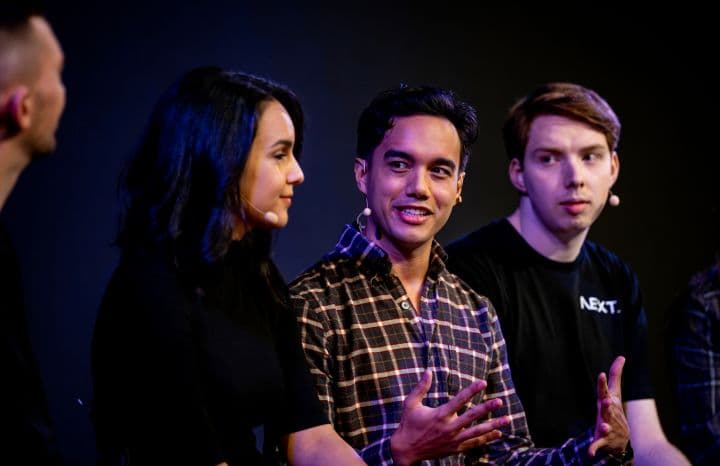 a group of people standing next to each other