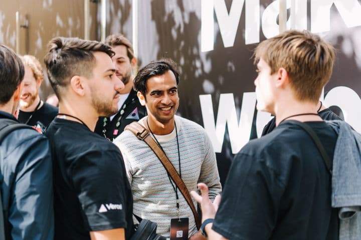 a group of young men standing next to each other