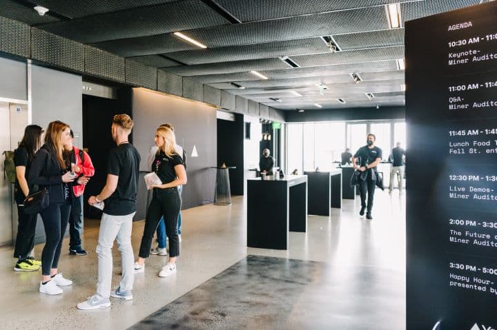 a group of people standing in a room