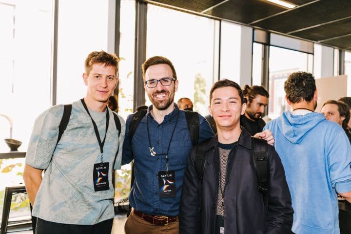 a group of men standing next to each other