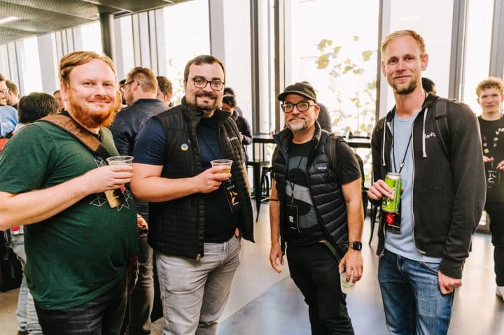 a group of men standing next to each other