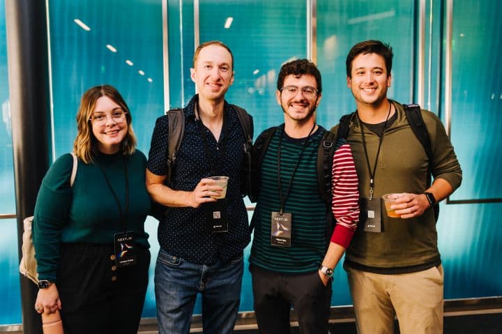 a group of people standing next to each other