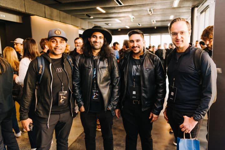 a group of men standing next to each other