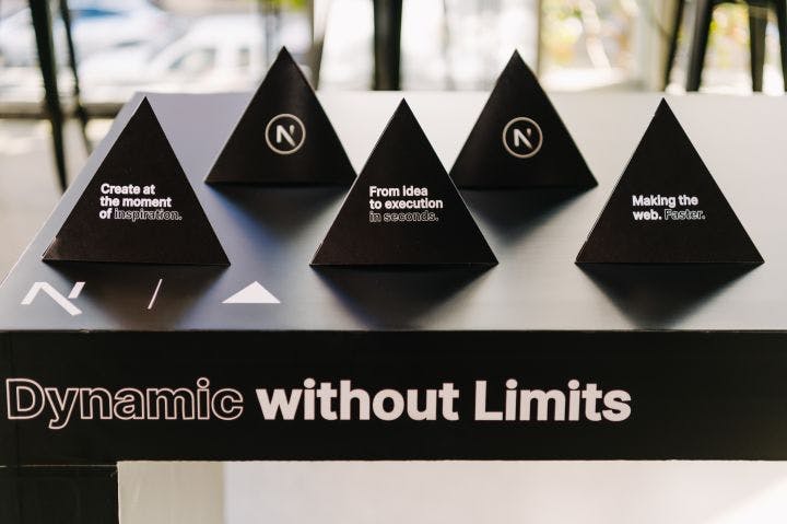 four pyramids sitting on top of a black table