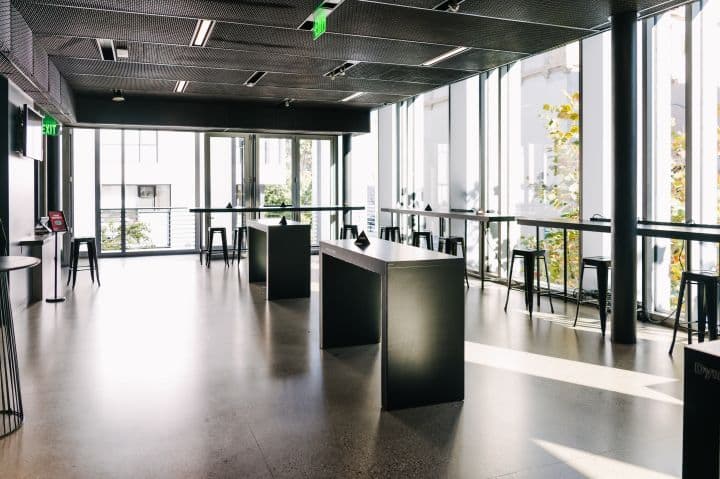 a large open room with tables and chairs