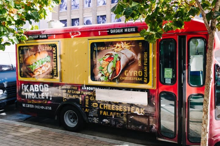 a food truck parked on the side of the road