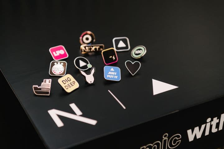 a bunch of pins sitting on top of a table