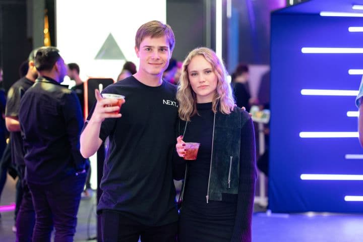 a man and a woman standing next to each other