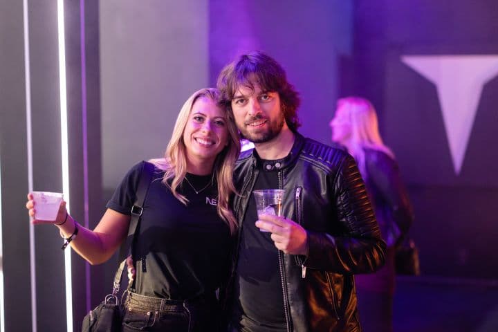 a man and a woman standing next to each other