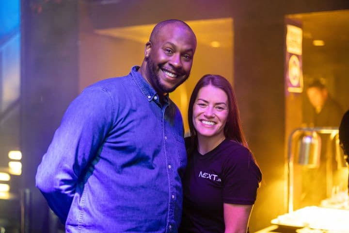 a man and a woman standing next to each other