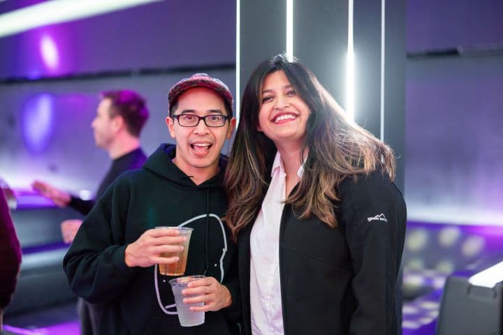 a man and a woman standing next to each other