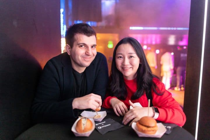 a man and a woman sitting at a table