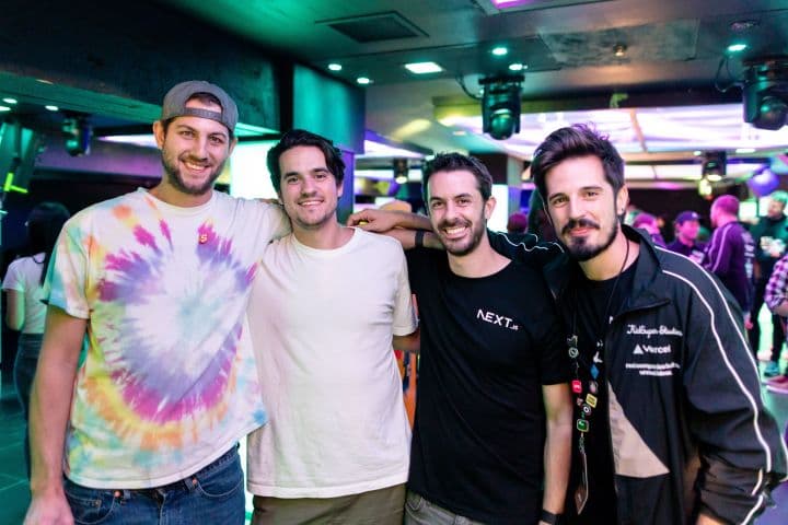 a group of men standing next to each other