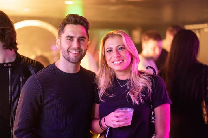 a man and a woman standing next to each other